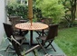 tarrasse privée dans un jardin arboré
