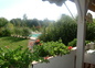 Terrasse vue sur parc et piscine